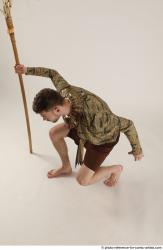 KEETA KNEELING POSE WITH SPEAR